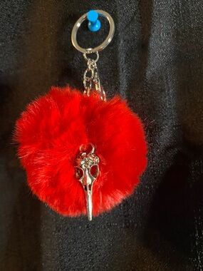 Red Faux Fur Pom Keychain with Silver Skull Charm